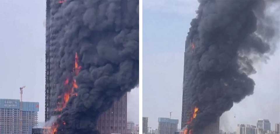 Rascacielos es consumido por las llamas en una ciudad en China