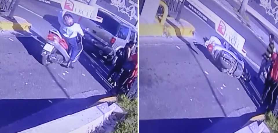 VIDEO: Pluma derriba a motociclista que se iba sin validar ticket en popular centro comercial de San Salvador