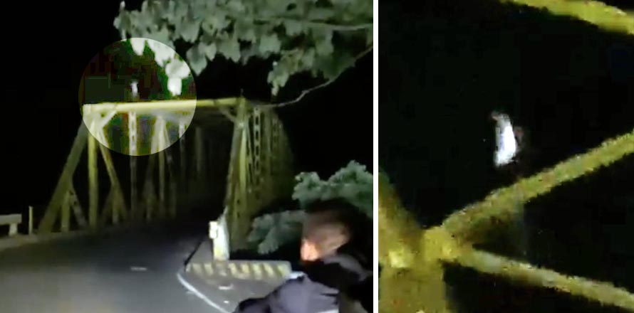Captan figura humana parada sobre un puente