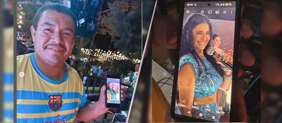 Ahuachapaneco se acerca a Verónica Guerrero para tomarle una foto tras visita en San Pedro Puxtla