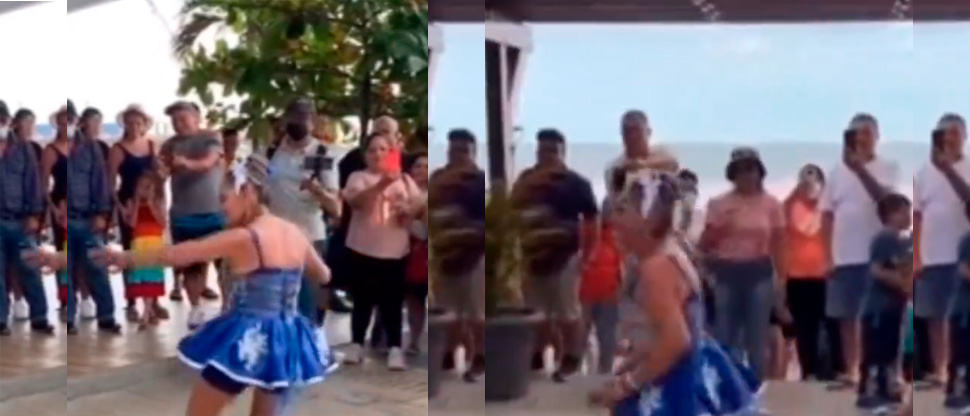 Yajaira se traslada al Puerto de La Libertad para cobrar $20 por fotos con turistas