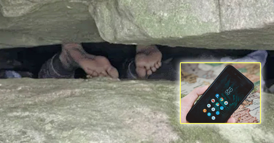 Mujer queda atrapada entre dos rocas al intentar recuperar su celular que se le cayó