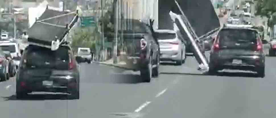 Salvadoreños reaccionan al ver que la «cama voladora» era transportada por una Kia Soul