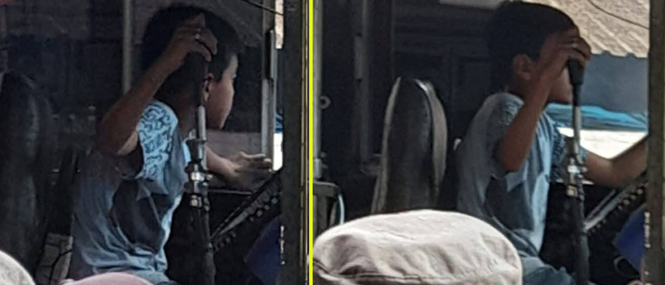 Captan a niño manejando bus interdepartamental en la terminal de Xela, Guatemala