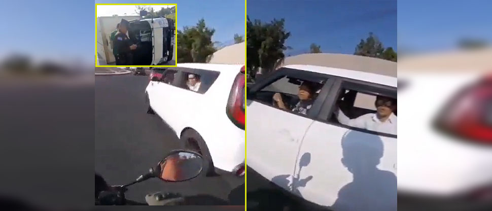 Motociclista encara a conductora de Kia Soul que huye tras provocar accidente en Ilopango