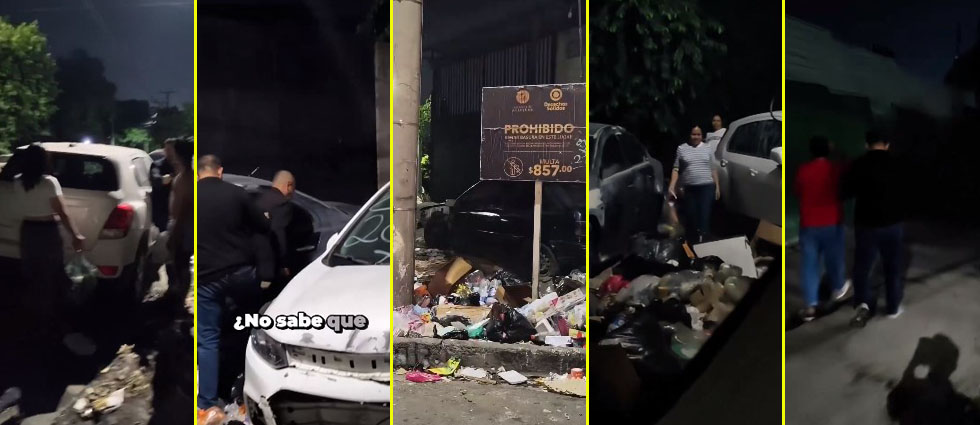 Captan a personas arrojando basura en zona donde hay un rótulo que anuncia que no está permitido hacerlo